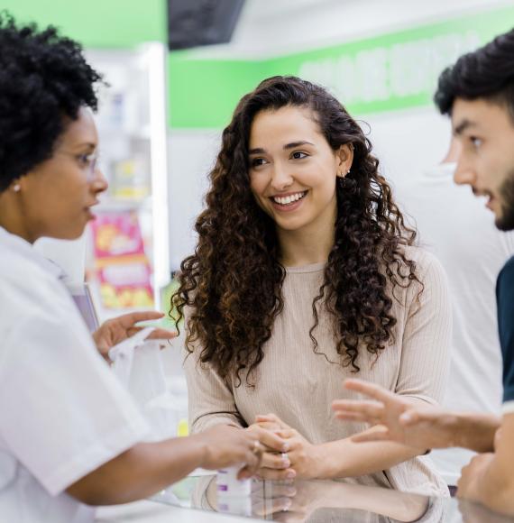 Pharmacist providing expert advice to customers