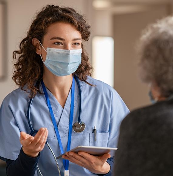Nurse talking with a patient