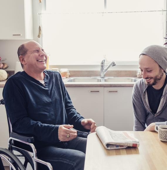 Disabled person receiving support in their home