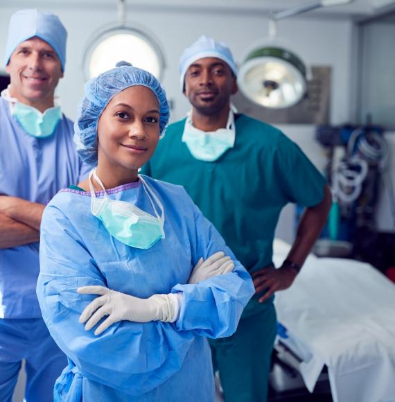 Group of medical colleagues in an operating theatre