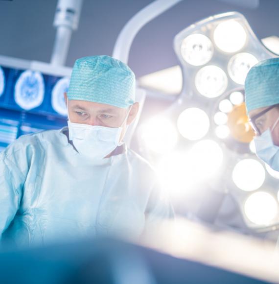 Surgeons working in an operating theatre