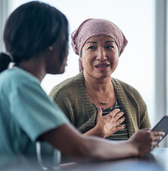 Woman in cancer meeting with a nurse