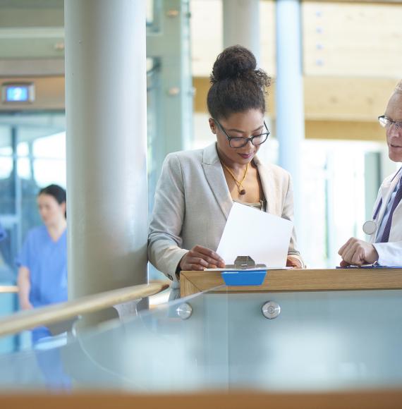 Medical colleagues discussing case data