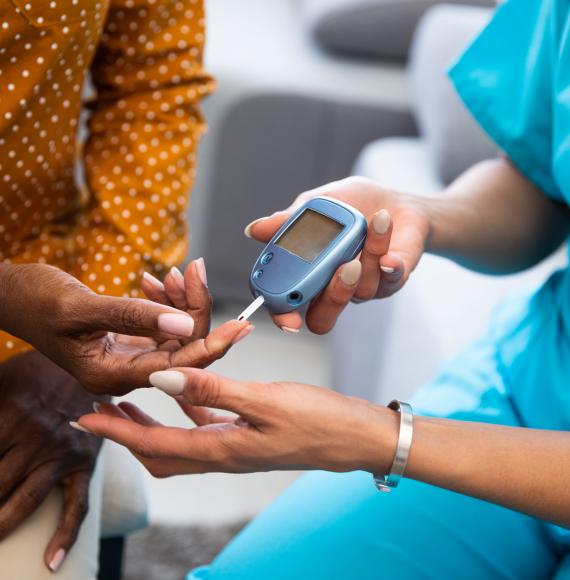 woman having blood pressure taken