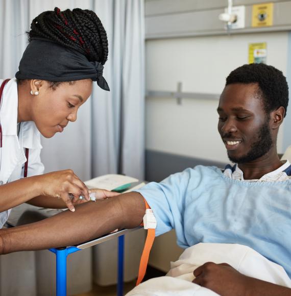 Black African man donating blood