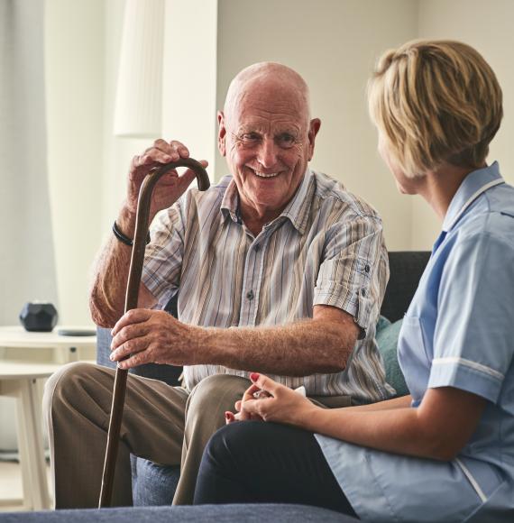 Elderly man in a care home receiving care