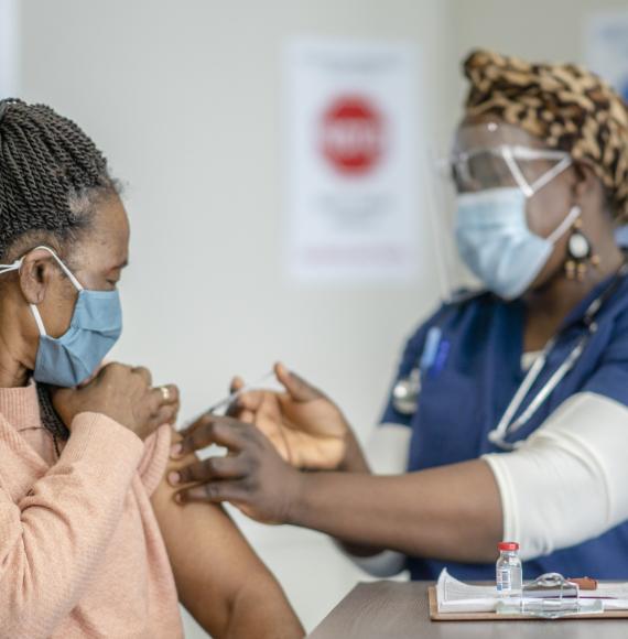 BAME person getting vaccinated 