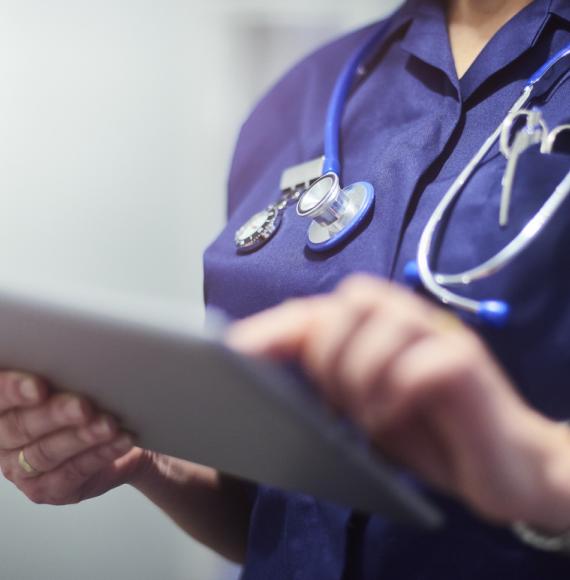 nurse using tablet