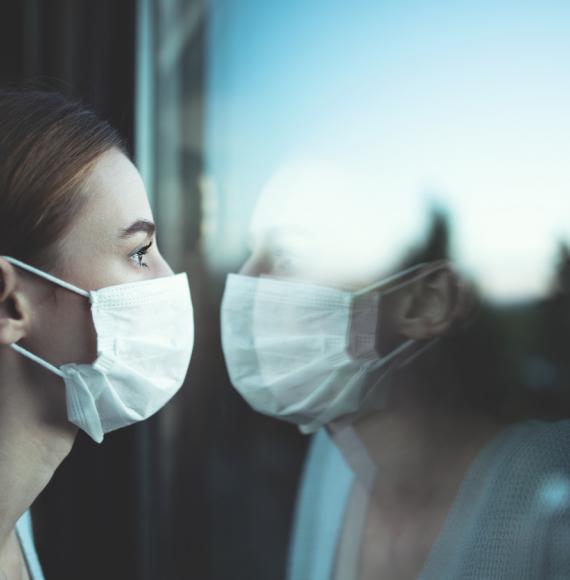 nurse looking out window 