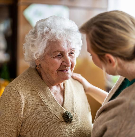 elderly lady with carer