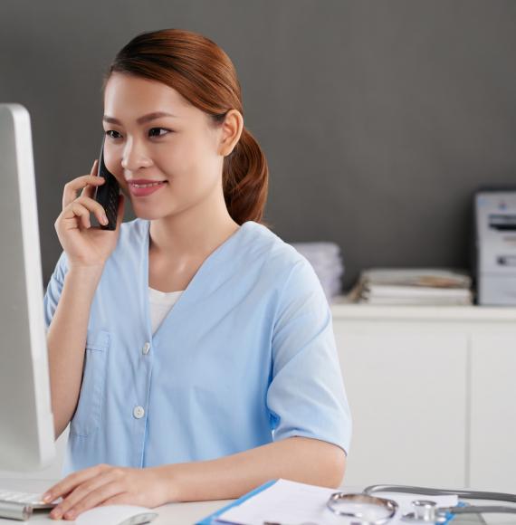 Medical receptionist using a DECT phone