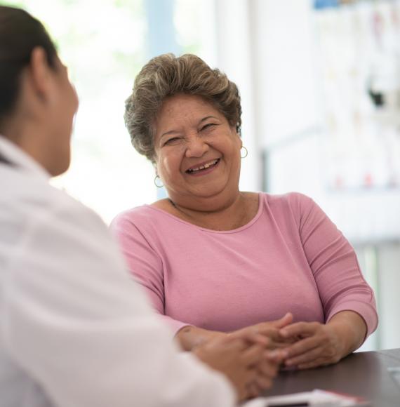 Woman consulting doctor