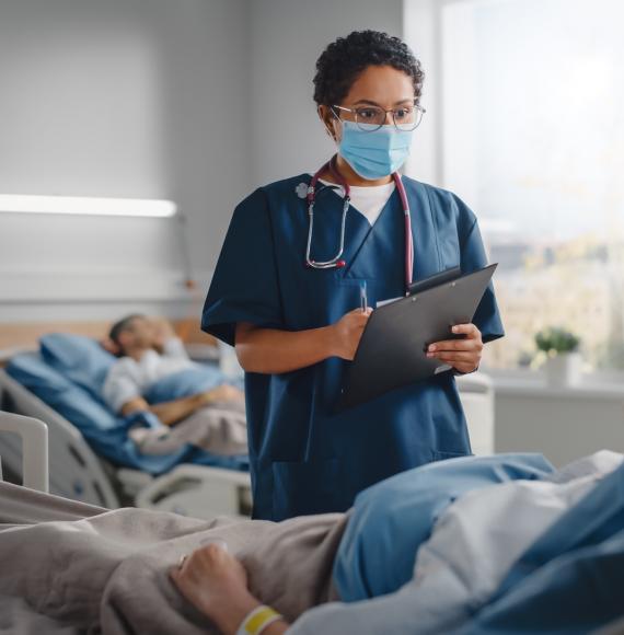 Nurse doing a ward round in a hospital