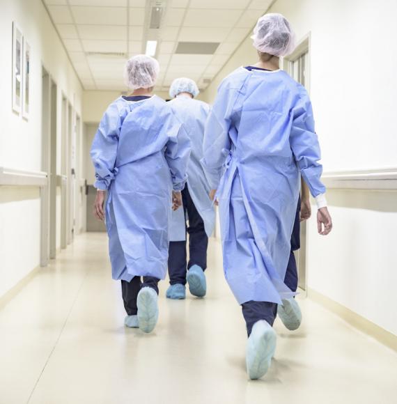 Medical staff walking through the corridor 