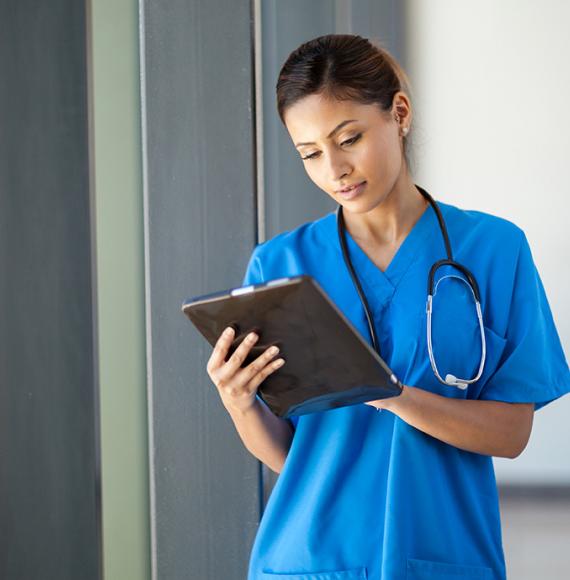 Health worker using a clipboard