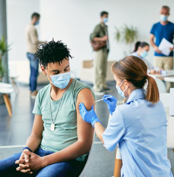 Doctor administering vaccine