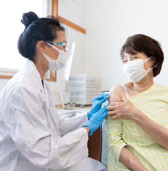 Doctor administering vaccine