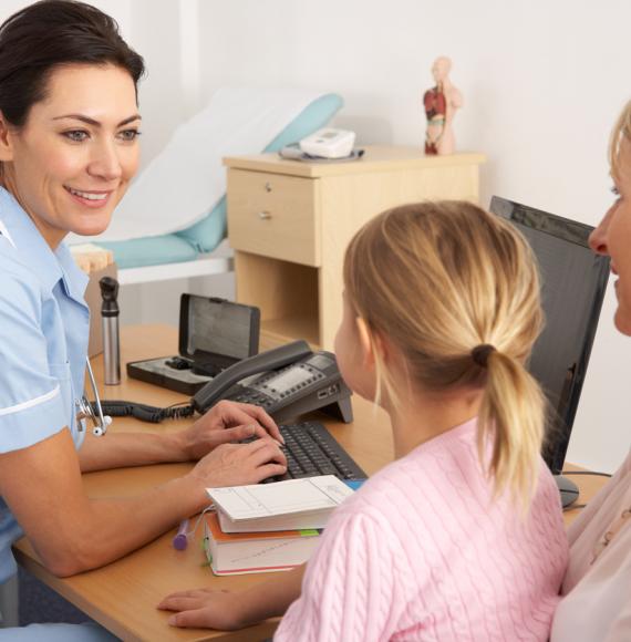 Nurse with mother and child