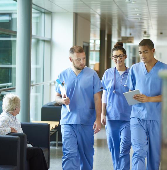 Nurses walking through corridor