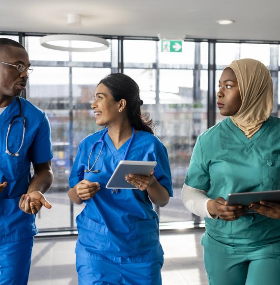 Medical staff walking through a corridor 