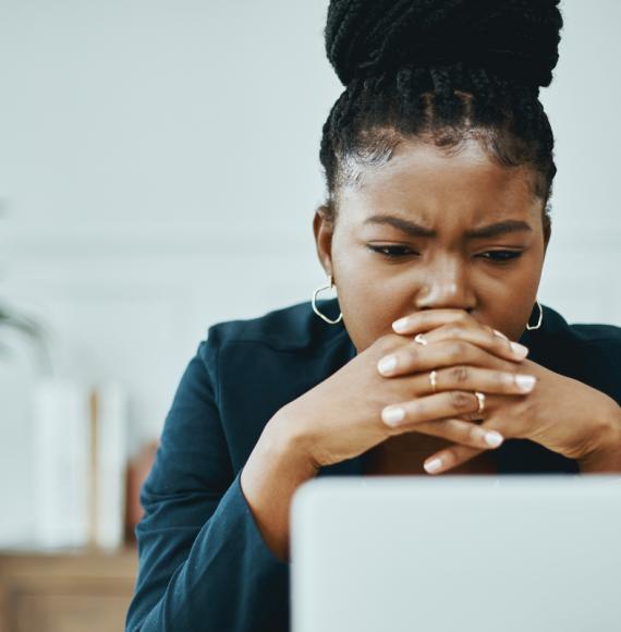 Young woman looking at computer