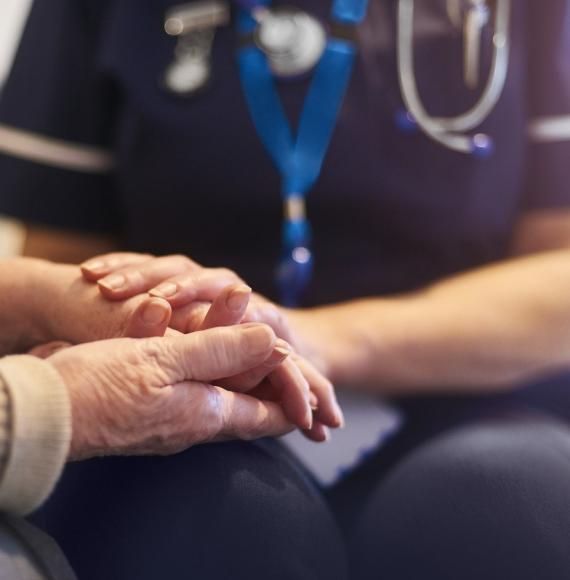 Nurse comforting patient