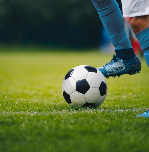 Close up of a person playing football