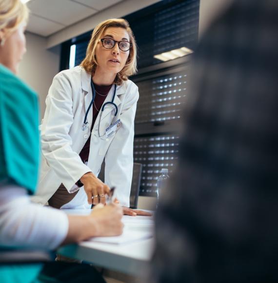 Female doctor in a team meeting