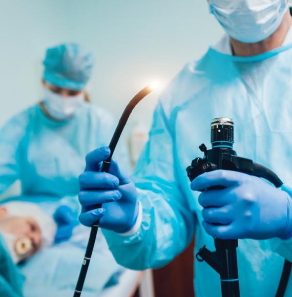 Doctor holding endoscope
