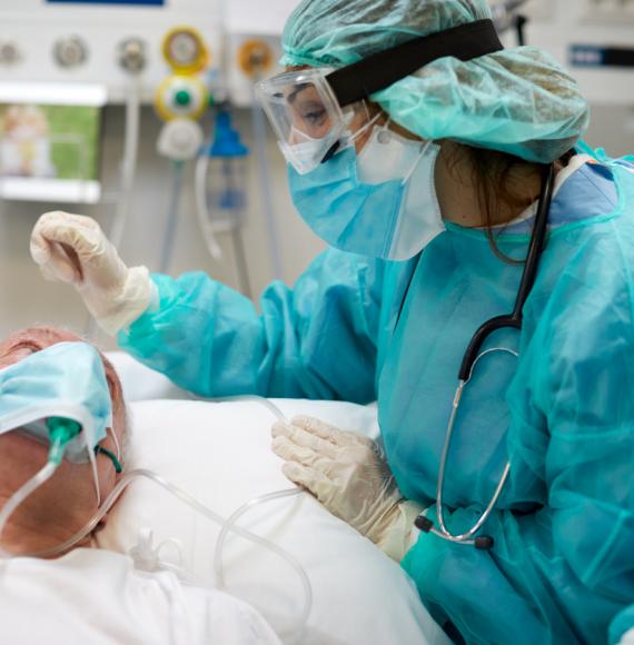 Nurse comforts Intensive Care Unit patient