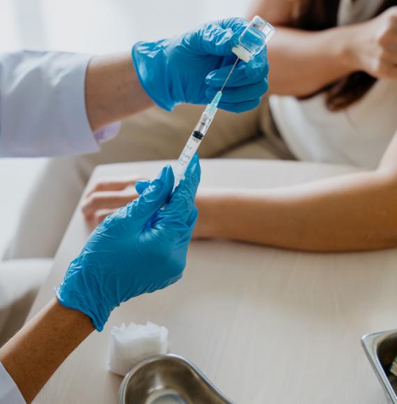 Female patient getting vaccination