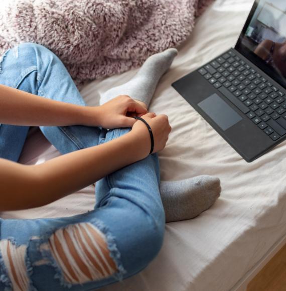 Computer on a bed