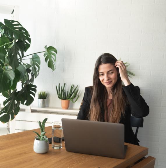 Young woman on a computer at home