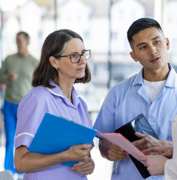 Nurses and doctors discussing treatment plan