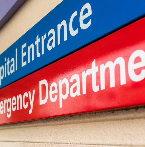 Hospital entrance and emergency department sign