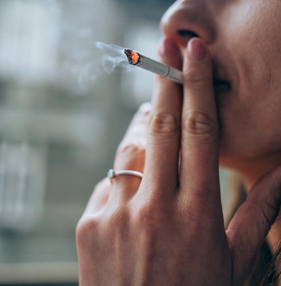 Young woman smoking a cigarette