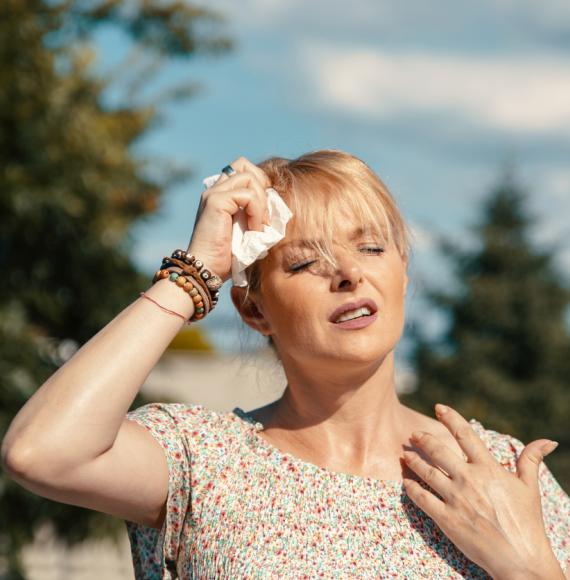 Woman experiencing extreme heat