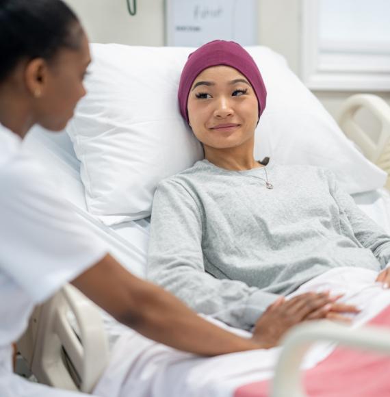 Patient in bed depicting cancer diagnosis