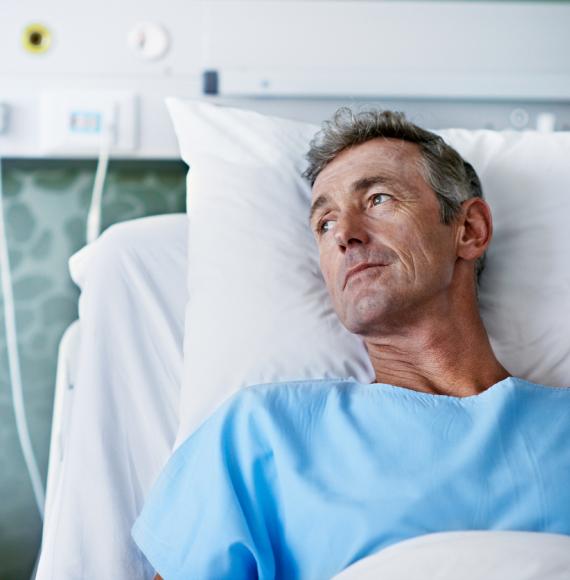 Patient in hospital bed depicting multiple long-term conditions