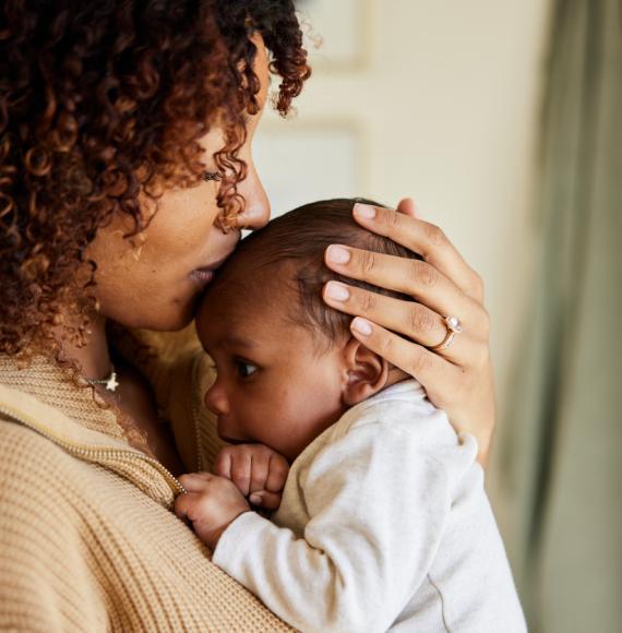 Mother holding her baby