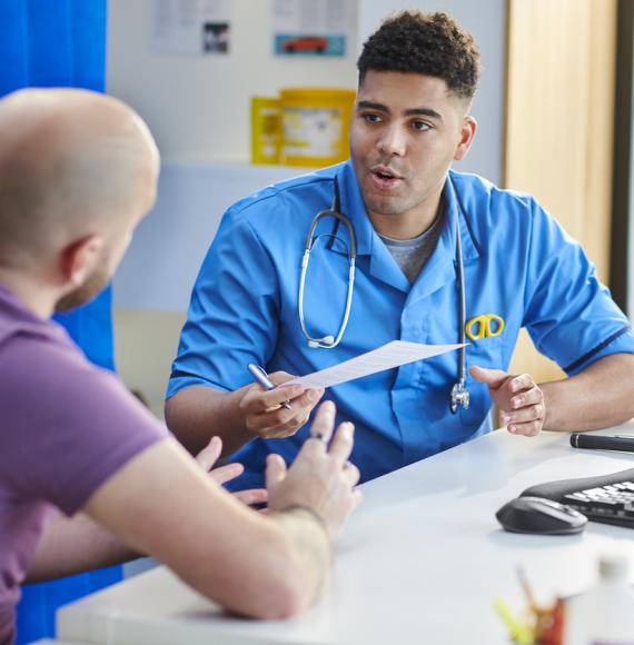 NHS doctor testing a patient