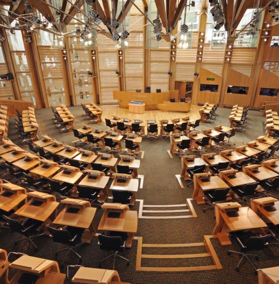 Inside Scottish Parliament depicting the unanimous passing of the patient safety commissioner bill