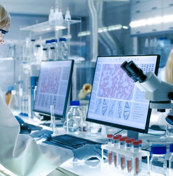 Woman in a laboratory depicting genomics research
