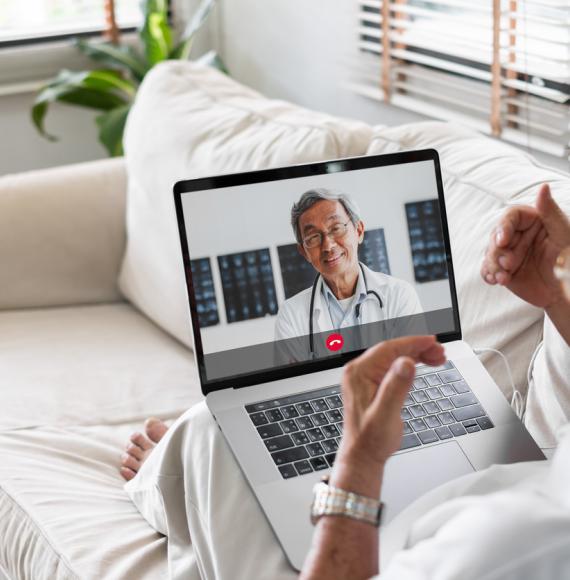 Patient on a call with a doctor depicting NHS virtual wards