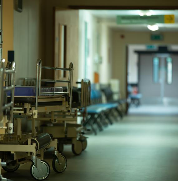 along an empty hallway of a hospital