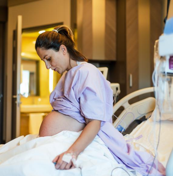 Young pregnant woman in the hospital ward