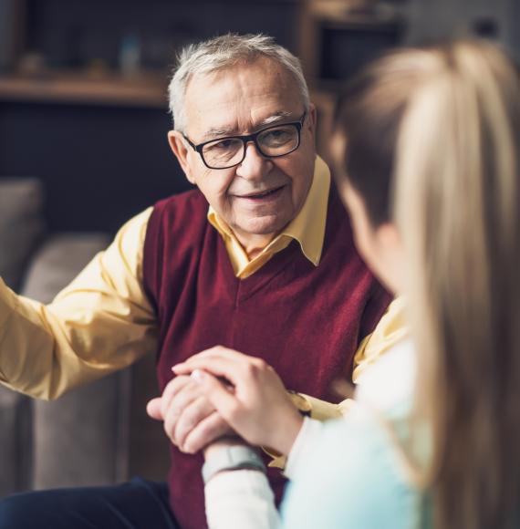 Home doctor is visiting senior man to check his health