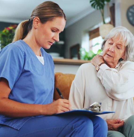 Older woman receiving care at home