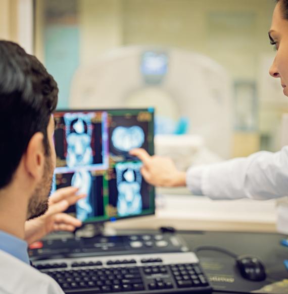 Doctors with a CT scan