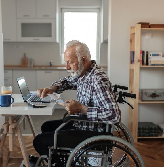 Disabled Senior Man in a Wheelchair